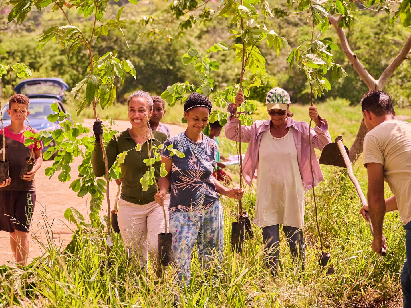 Smallholder farmers and their families in a field