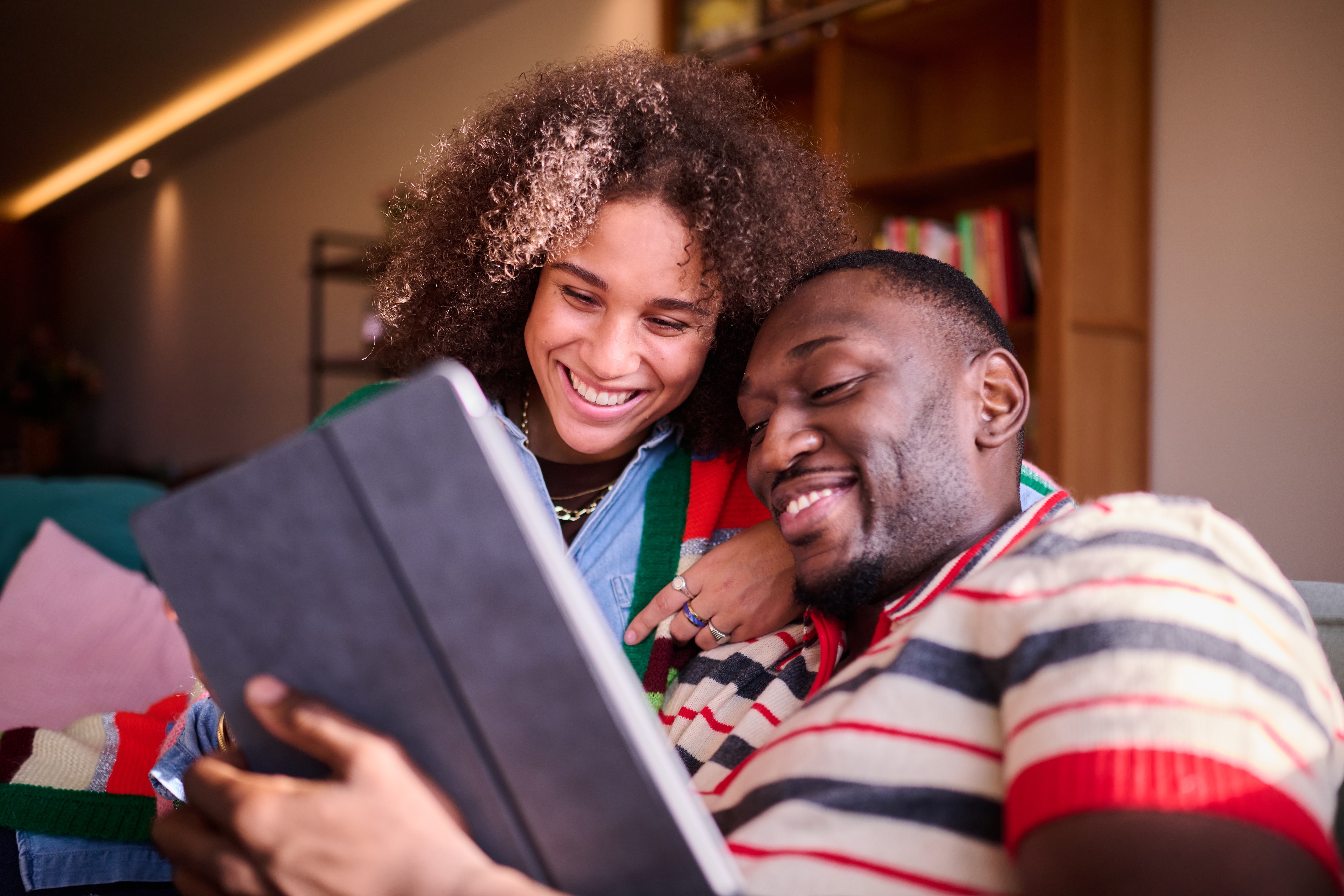 young couple with ipad