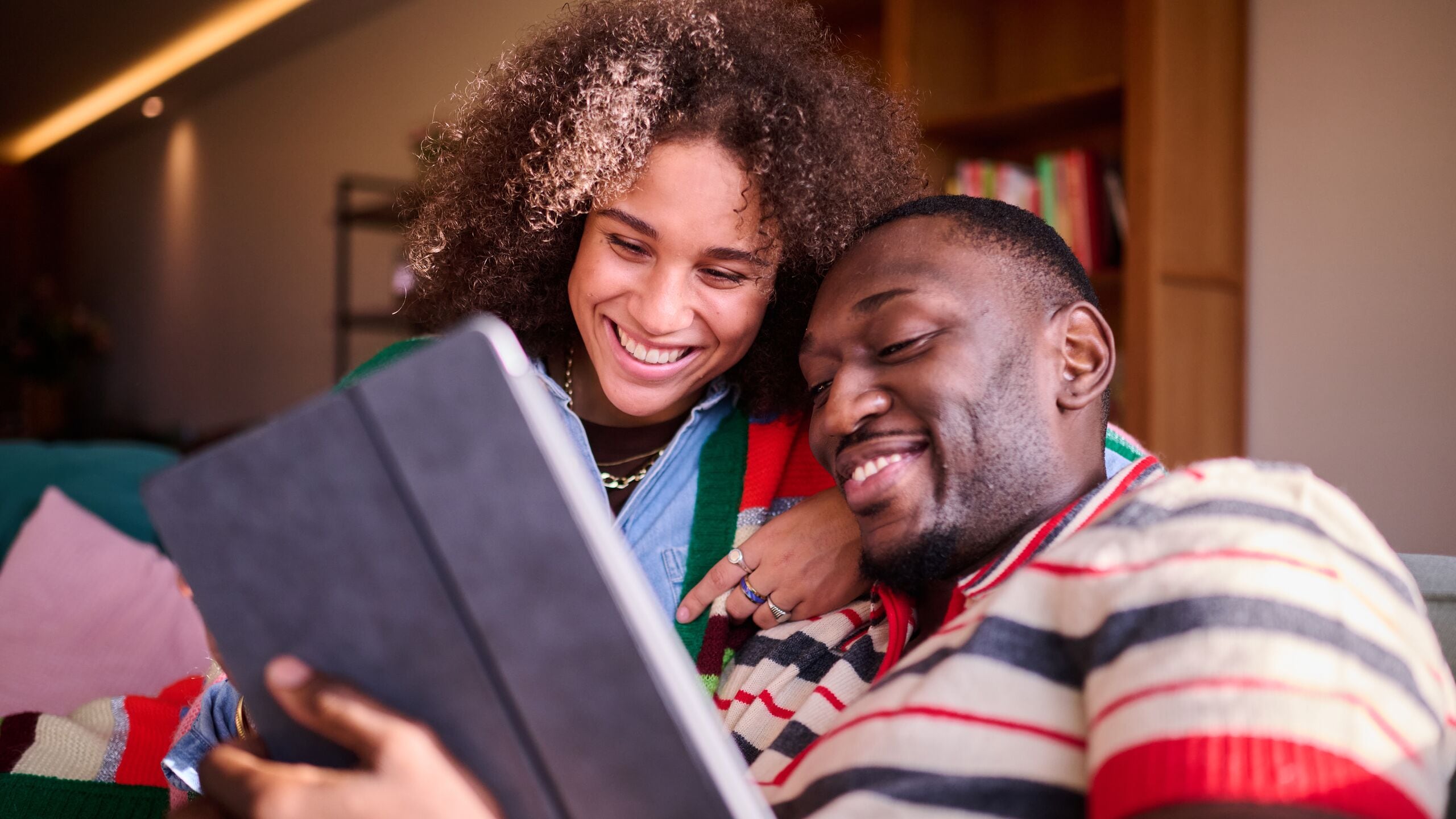young couple with ipad