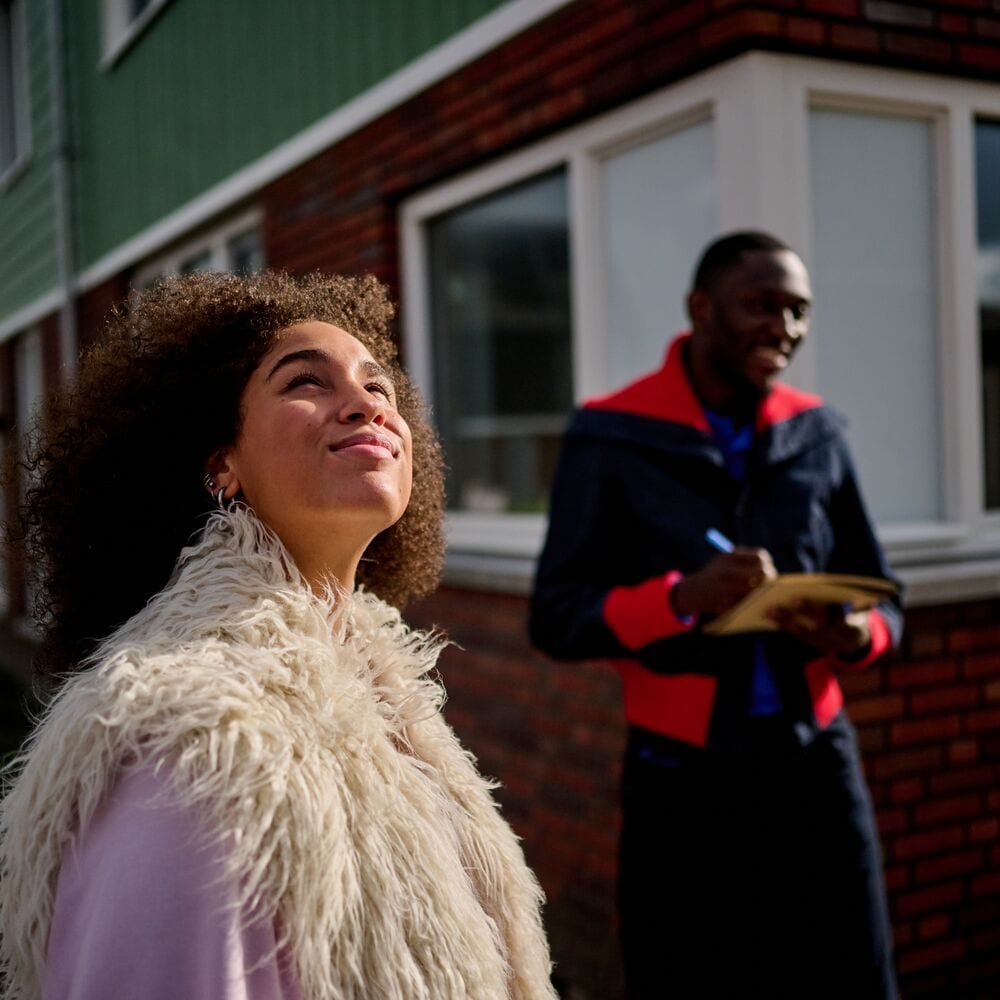 young couple at the construction site