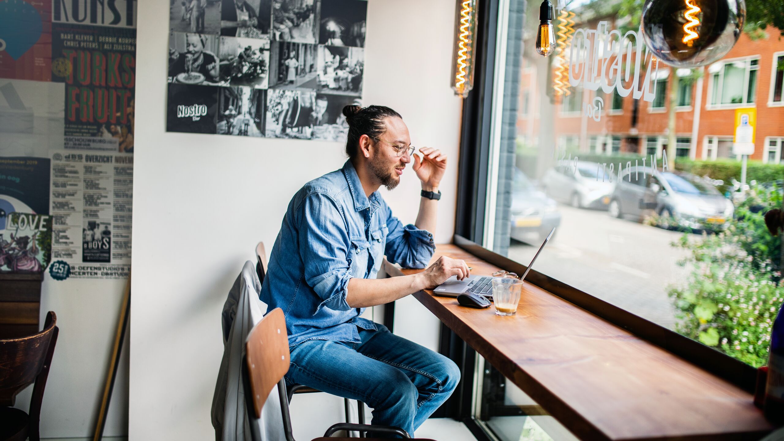 Working remotely in a cafe - Hybrid working at home, on the road and in the office