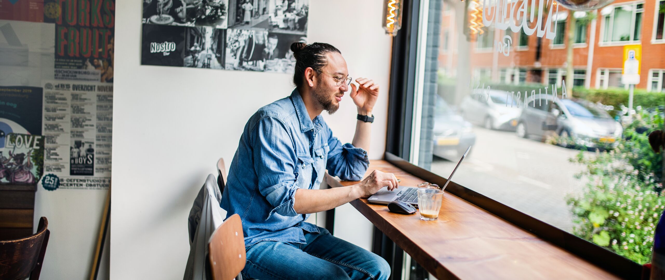 Working remotely in a cafe - Hybrid working at home, on the road and in the office