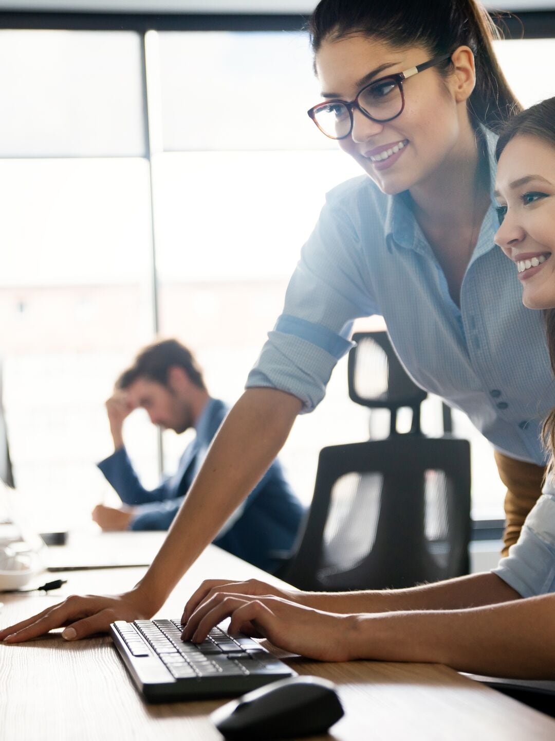 Creative people working in office on computer